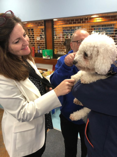 Caroline meeting a support animal working in the NHS
